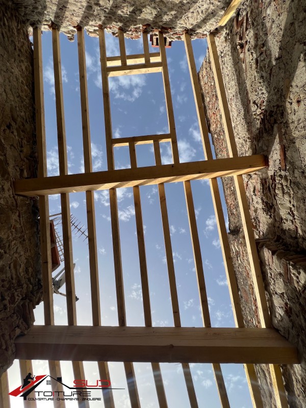 Changement de 2 poutres pour réparation d'un toit