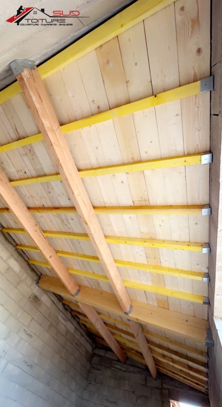 Création d'une charpente et d'une toiture pour une maison neuve à Perpignan