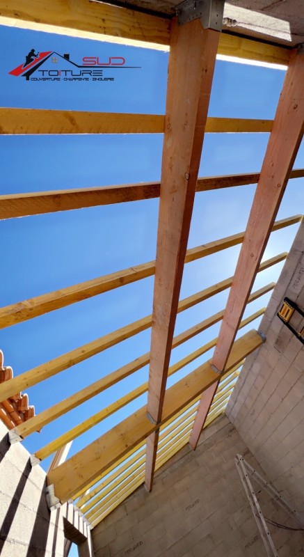 Création d'une charpente et d'une toiture pour une maison neuve à Perpignan